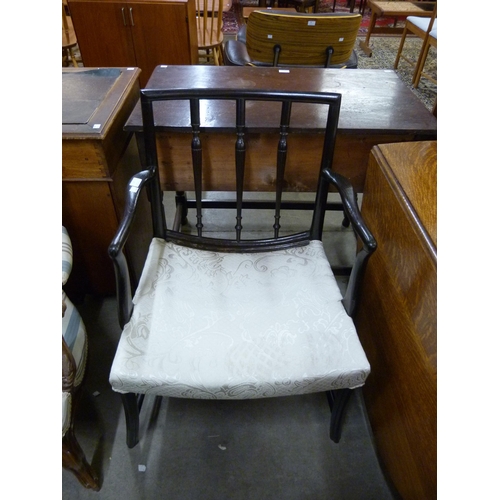 137 - A 19th Century Hepplewhite style elm elbow chair and a stool