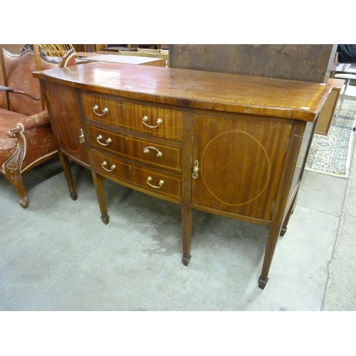 144 - An Edward VII inlaid mahogany bow front sideboard