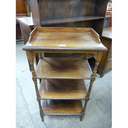 145 - A Victorian four tier rosewood whatnot