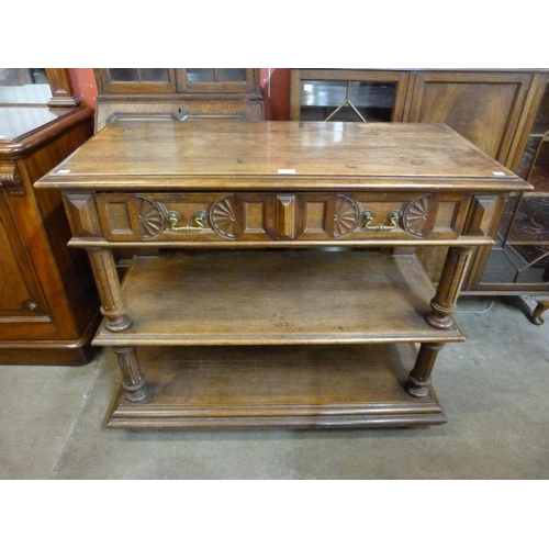 15 - A 19th Century French chestnut three tier buffet sideboard