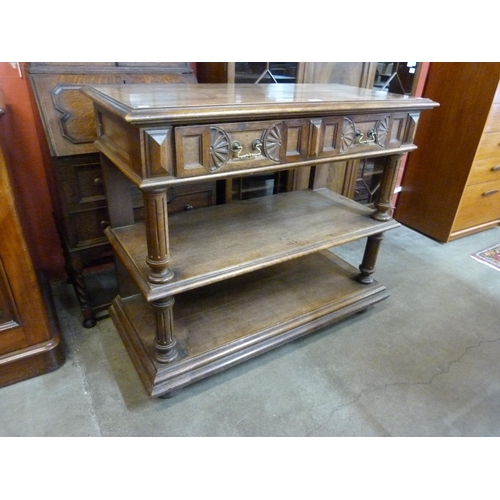 15 - A 19th Century French chestnut three tier buffet sideboard