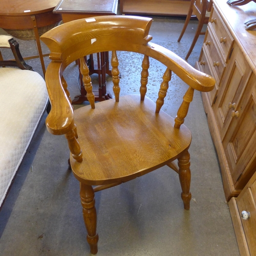 163 - An oak and beech smokers bow chair