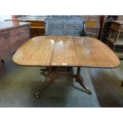 17 - A George IV mahogany Cumberland drop leaf table