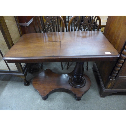 184 - A Victorian mahogany adjustable double sided reading table