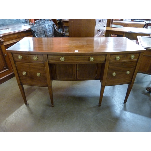 19 - A Regency inlaid mahogany bow front sideboard