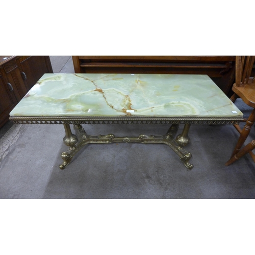 208 - An Italian brass and onyx topped coffee table