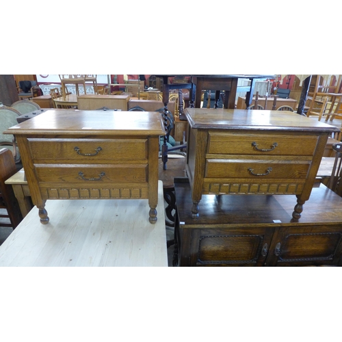 211 - A pair of Adam Bede oak bedside chests