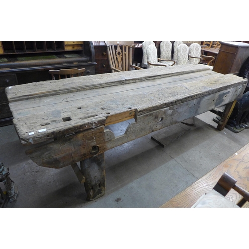 238 - A large industrial pine work bench