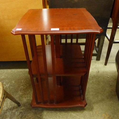 246 - A mahogany revolving bookcase