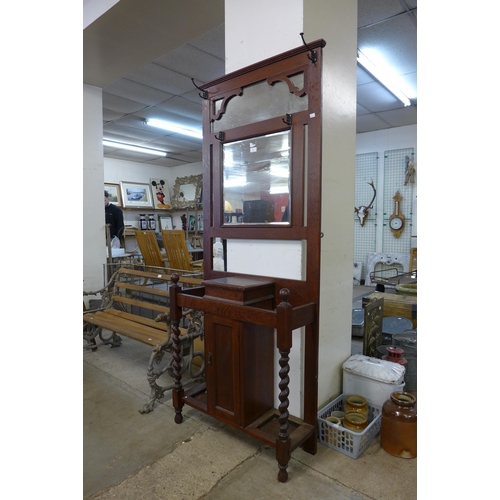 253 - An early 20th Century oak barleytwist hallstand