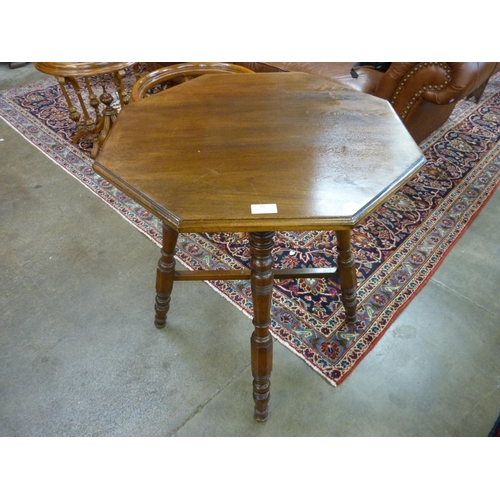 27 - A Victorian Gillows style walnut octagonal occasional table