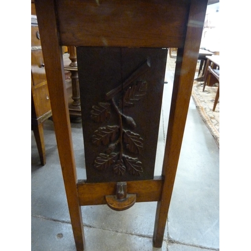 27A - An Acorn Man style carved oak occasional table