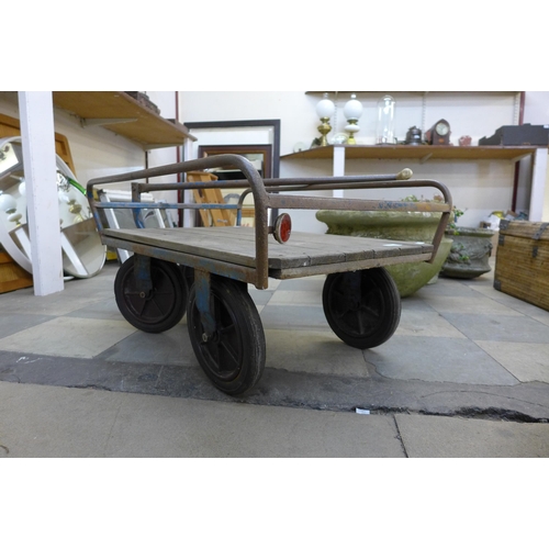 285 - A metal framed pine trolley