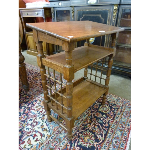 3 - A Liberty & Co. Arts and Crafts oak reading stand, designed by Leonard Wyburd