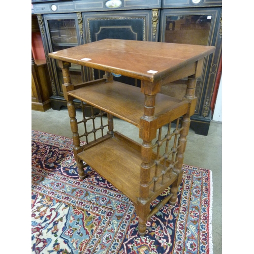 3 - A Liberty & Co. Arts and Crafts oak reading stand, designed by Leonard Wyburd