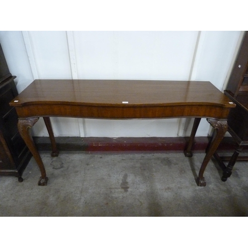 32 - A Regency style mahogany serpentine serving table