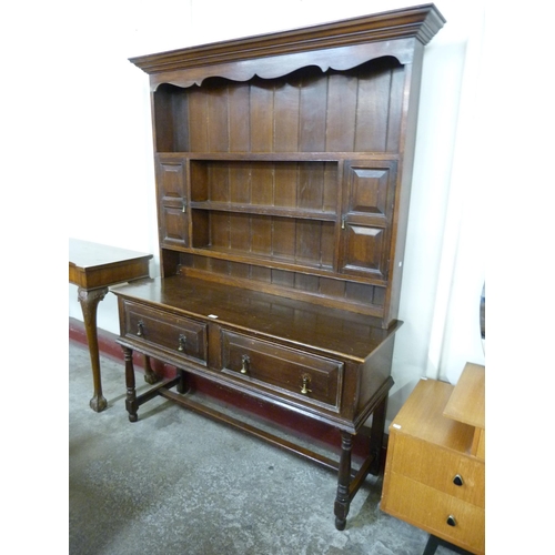 33 - A George III style oak dresser