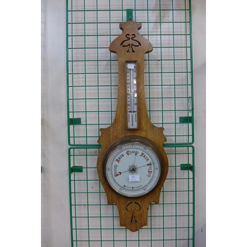 330 - An Edward VII oak aneroid barometer