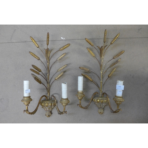 332 - A pair of gilt metal wall lights