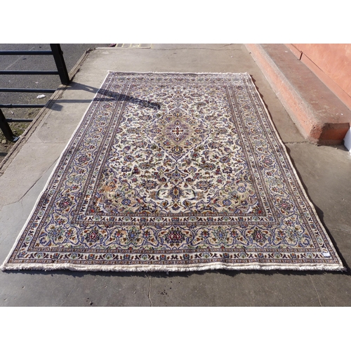 41 - A Persian cream ground Kashan rug, 295 x 200cms, a/f