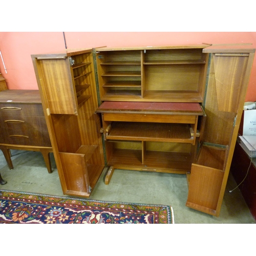 48 - A Newcraft Ltd. teak home office cabinet