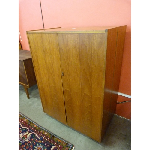 48 - A Newcraft Ltd. teak home office cabinet