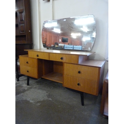 54 - A teak dressing table