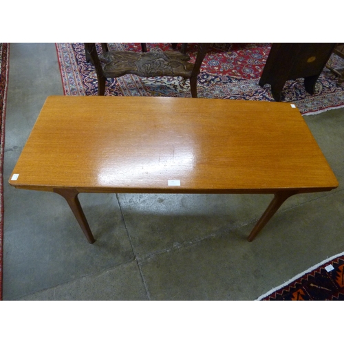 65 - A McIntosh teak extending coffee table