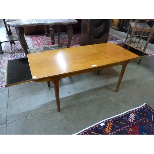 65 - A McIntosh teak extending coffee table