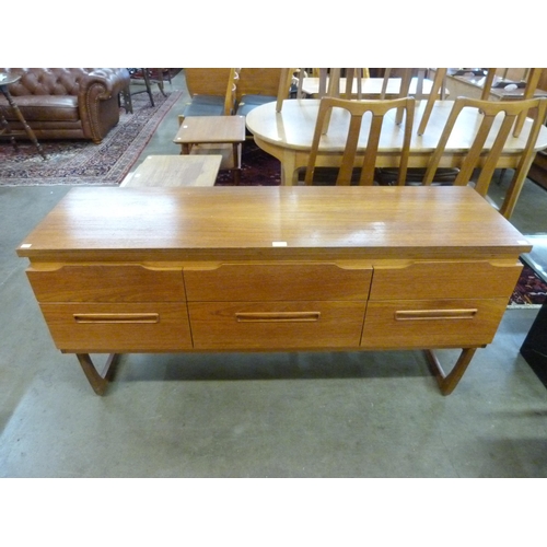 76 - A teak sideboard