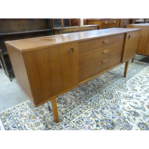 77 - A teak sideboard