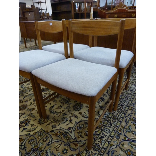 85 - A set of four McIntosh teak dining chairs