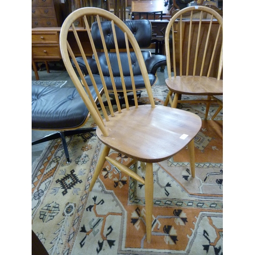 86 - A set of four Ercol Blonde elm and beech Windsor chairs