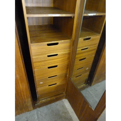 95 - A teak three piece bedroom suite, retailed by Heals of London