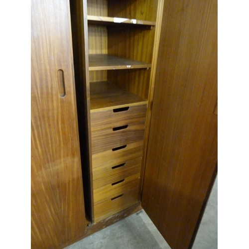 95 - A teak three piece bedroom suite, retailed by Heals of London