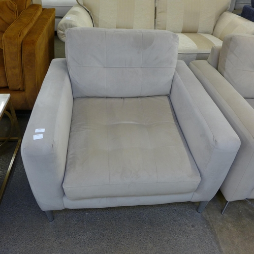 1335 - A grey velvet pinched back armchair