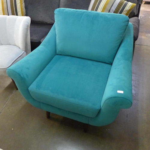 1360 - A turquoise velvet armchair