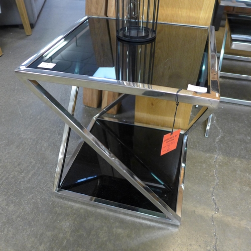 1370 - A chrome and black glass lamp table