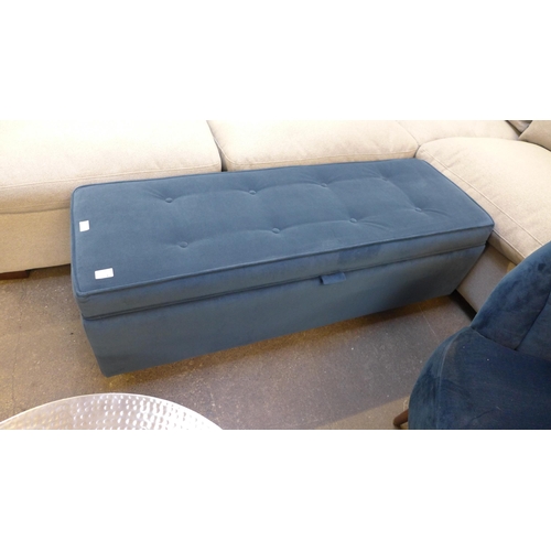 1428 - A deep blue velvet ottoman