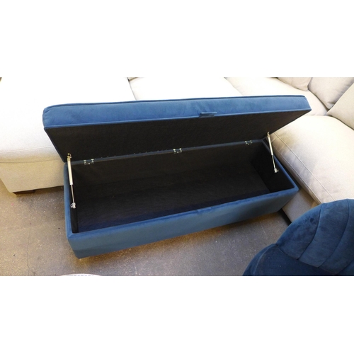 1428 - A deep blue velvet ottoman