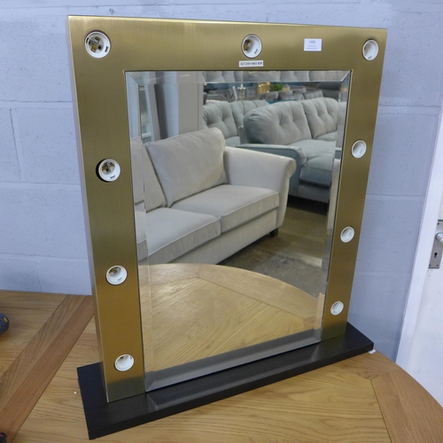 1431 - A gold framed Hollywood mirror