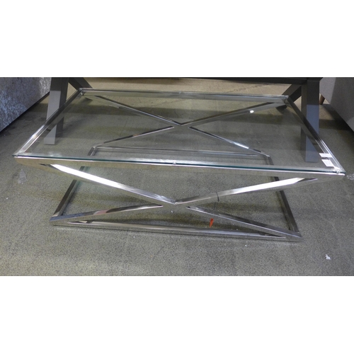 1450 - A chrome and glass coffee table