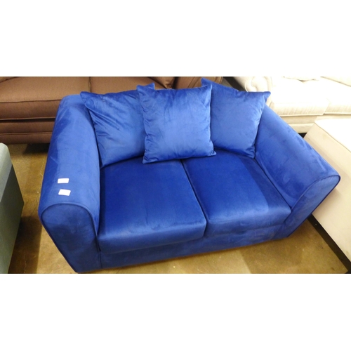 1477 - A blue velvet two seater sofa