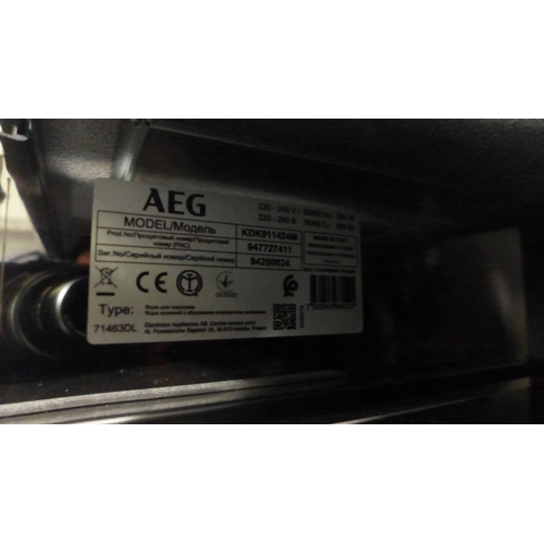 3003 - AEG Stainless Steel And Black Warming Drawer  H140xW595XD535 - model no KDK911424M  Original RRP £45... 