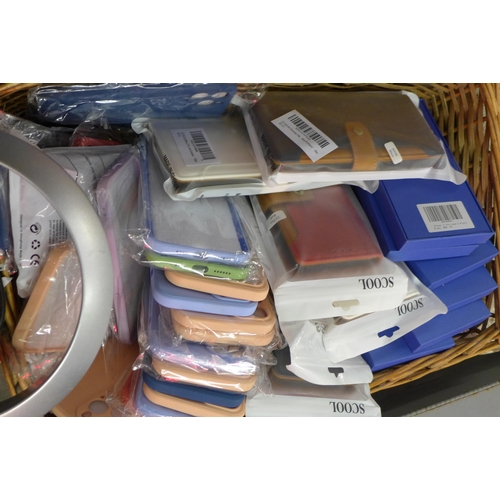 2060 - Basket of Iphone cases, 2 bags of DVD's (various titles) with Goodmans dvd player