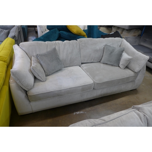 1452 - A Halley silver upholstered 4 seater sofa