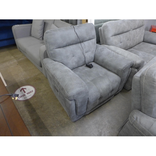 1499 - A manual reclining three seater sofa, fixed back two seater sofa and electric reclining armchair, al... 