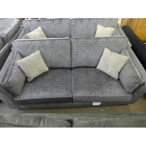 1540 - A Dolce magnesium upholstered 3 seater sofa- worn