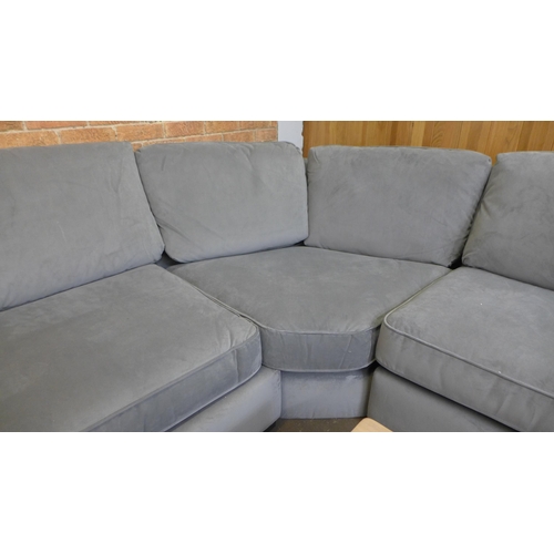 1547 - An Audrey elephant grey velvet curved LHF corner sofa - small tear