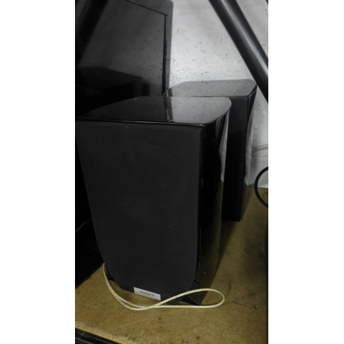 2380 - Pair of Tannoy speakers with stands and REL speaker